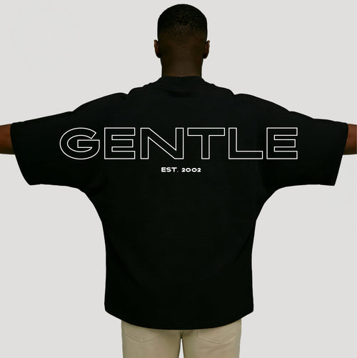 Rückansicht des Gentle Oversized T-Shirts 02 von GrindTrap aus 100 % Premium-Baumwolle mit großem „GENTLE EST. 2002“ Rückenprint